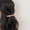 Barrette à cheveux élégante avec double nœud en cuir abricot sur cheveux longs - Abricot