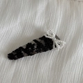 Close-up of black floral lace hair clip featuring a delicate white pearl bow accent - Black Lace Pearl Bow BB Clip