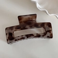 Detalle de una pinza para el cabello rectangular con acabado de carey brillante - Leopardo Gris Rectángulo (10.5cm)