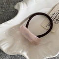 Detailed macro view of high-elastic pink hair tie with France Handmade resin charm - Pink