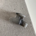 Detail shot of mini acetate hair claw clip with grey ink marble texture on linen fabric - Ink Style - Small Hair Claw
