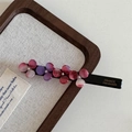 Detailed close-up of handmade acetate flower clip with gradient petals and rhinestones - Deep Pink