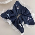 Detail of denim scrunchie with lace edges and colorful ribbon bows on white surface - Dark Blue (Deep Square Scrunchie)
