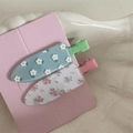 Close-up of floral duckbill hair clips with daisy and pink flower patterns on pink card - Sweet Pair - Green White