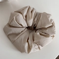 Detailed close-up of large beige scrunchie showing premium pleated fabric texture and volume - Beige Apricot