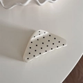 Close-up of a French style cream polka dot hair claw clip with vintage triangular design - White Polka Dot - Triangle