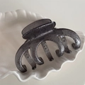 Detail of large glitter grey resin hair claw clip featuring silver sequins in a shell tray - Claw Style / Black