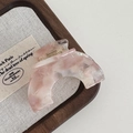 Pink marble acetate hair claw clip with golden spring on a minimalist tray - Sakura Pink