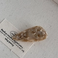 Detailed macro view of marbled acetate hair clip with brown and cream textures - Khaki Color