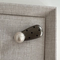 Vintage style polka dot hair clip with large white pearl on textured beige box - Waterdrop Pearl Clip - Premium Gray