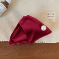Macro shot of deep red velvet jewelry pouch with elegant pearl closure and triangular design - Red