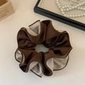 Detailed view of large satin scrunchie in coffee and cream contrast colors - Beige and Coffee Color Block