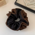 Detailed view of large retro hair scrunchie with layered contrast edges and satin fabric - Black and Coffee Color Block