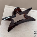 Dettaglio della pinza per capelli a forma di stella ambra traslucida lucida - Stile Stella / Tè Trasparente