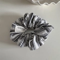 Detail of hand made label on a striped fabric scrunchie with soft cotton texture - Sea Salt Series Striped - Black White