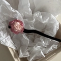 Close-up of pink camellia floral hair pin with black wooden stick on paper background - Hair Stick / Rose Pink
