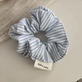 Detail of blue and white striped fabric scrunchie with a hand made woven label - White Striped Hair Tie