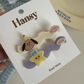 Detail of cute wavy resin hair clips with cartoon dog and star characters in pastel colors - Wave Cartoon-Star Dog