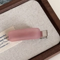 Close-up of pink matte acetate hair clip with silver metal spring on a rustic wooden tray - Rectangle Candy Clip / Pink