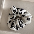 Close-up of white silk scrunchie with black butterfly prints in a fabric tray - Hair Tie / Print Butterfly White