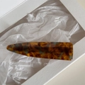 Detailed close-up of handmade amber acetate hair clip with FRANCE Handmade engraving - Acetate Long Triangle Clip / Blue Coffee