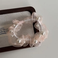 Detail of pink organza hair scrunchie with embedded pearls and high-elasticity band - Pink