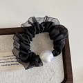 Detailed view of the iridescent pearl on a black organza and satin scrunchie - Mesh Edge Iridescent Bead - Black