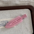Matte pink no-crease hair clip displayed on elegant fabric inside a wooden tray - Jelly Color Large No-Trace - Peach Pink