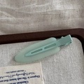 Matte mint green duckbill hair clip with translucent jelly finish on a rustic linen background - Jelly Color Large No-Trace - Mint Green
