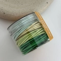 Jar of colorful green elastic hair bands for girls in mint and emerald shades - Green Series