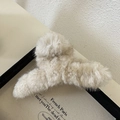 Elegant beige plush hair claw clip for women featuring soft warm faux fur texture - Beige