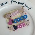 Detailed set of three cute dachshund hair clips in pink and blue patterns on white tray - Dachshund Set / Pink Blue Pink