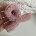 Elegant plush light pink cross hair claw clip with a soft faux fur texture for women - Pink