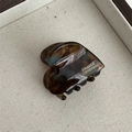 Close-up of heart-shaped tortoiseshell hair claw with gold France Handmade lettering - Heart Acetate Gold Label - Blue Coffee