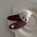 Detail of red plush hair clips with cute white bear and heart rhinestone on a ceramic tray - Red and White Bear
