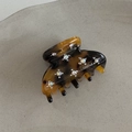 Macro detail of handmade tortoiseshell acetate hair claw clip with sparkling rhinestones - Starry Sky Dark Tortoise