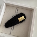 Detail of oval black knitted hair clip with gold metal handmade in Korea label - Black Waterdrop Shape Rectangular Tag