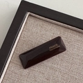 Close-up of minimalist dark brown acetate hair clip with gold France Handmade lettering - Dark Coffee