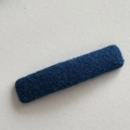 Detailed close-up of a navy blue fabric-wrapped snap hair clip with a warm wool texture - Fabric Rectangular BB Clip / Blue
