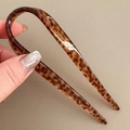Detail of tortoise shell U-shaped hair pin featuring Creation France engraving - Tortoiseshell