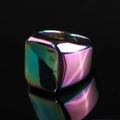 Polished iridescent titanium steel signet ring with a colorful square face and mirror reflection - Rainbow