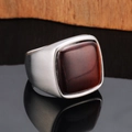 Detail of vintage men's steel ring featuring red tiger eye stone and brushed texture - Steel Tiger Eye