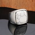 Macro shot of men's vintage steel ring with square white stone and marble texture - US 7 / Steel White Turquoise