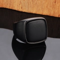 Macro shot of men's matte black titanium ring with a square signet design and brushed finish - US 7 / Black Agate