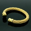 Brazalete de cable trenzado en acabado dorado con extremos de bolas pulidas - Dorado Estilo D (Extremo Esférico)