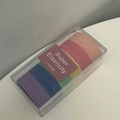 Detail view of colorful high-elastic hair ties in a transparent storage box - Gradient 6-Color