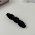 Detalle de una pinza para el pelo negra trenzada con letras doradas de SANSHINE Handmade - Pinza Trenzada Negro Sólido