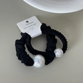 Dettaglio di due elastici neri con grandi perle iridescenti su cartoncino espositivo - Decorazione a sfera / Set Perle Tonde - Nero
