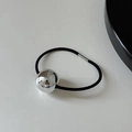 Detail of high-elastic black hair tie featuring a large polished silver metal bead - Mirror Ball Style / Silver Bead Black Tie