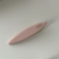 Nahaufnahme der rosa ovalen Haarspange mit goldenem SANSHINE Handmade Schriftzug - Rosa
